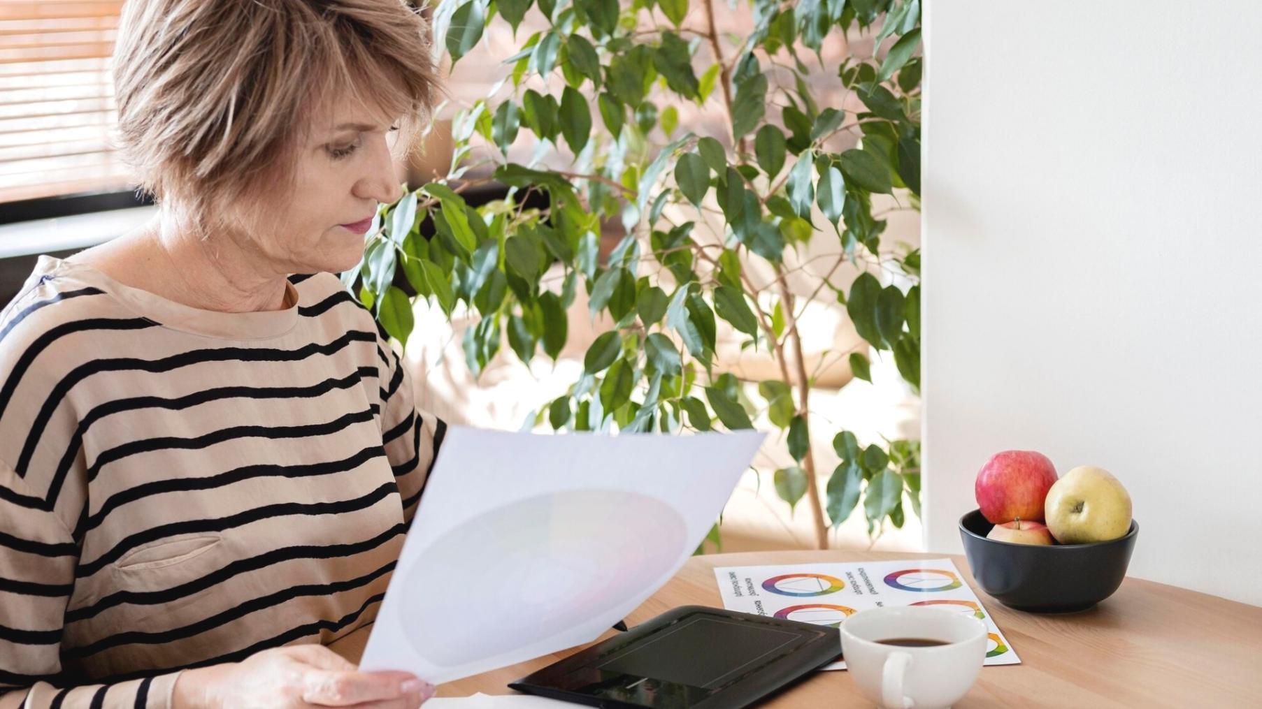 Financial planning workspace with charts and documents